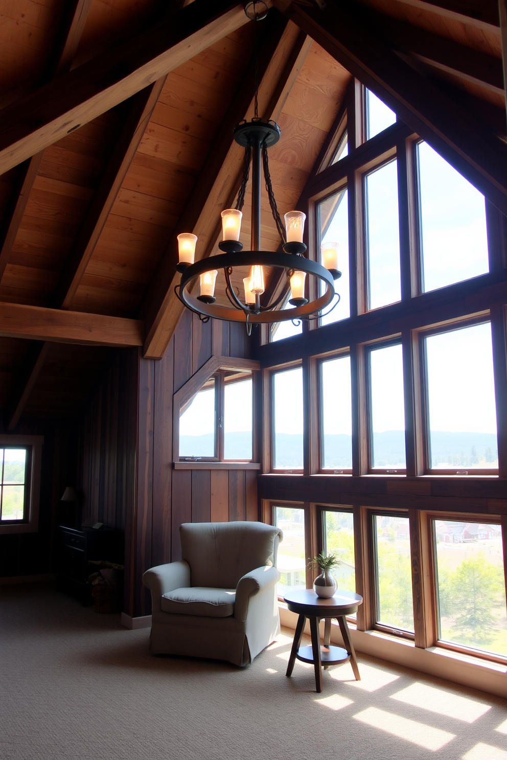 A rustic chandelier hangs from the exposed wooden beams of the attic, casting a warm glow throughout the space. The room features a cozy seating area with a plush armchair and a small wooden coffee table, inviting relaxation. The walls are adorned with reclaimed wood paneling, enhancing the rustic charm of the attic. Large windows allow natural light to flood the room, showcasing the beautiful views outside.