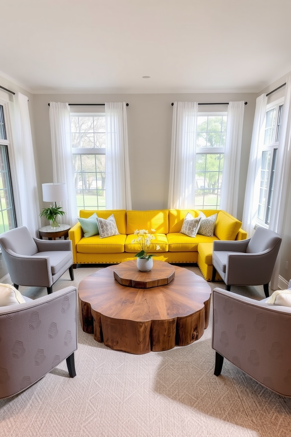 A bright yellow sectional sofa is positioned at the center of the family room, creating a cheerful and inviting atmosphere. Surrounding the sofa are accent chairs in soft gray fabric, along with a round coffee table made of reclaimed wood. The walls are painted in a light neutral tone, enhancing the vibrancy of the yellow sofa. Large windows allow natural light to flood the space, complemented by sheer white curtains that add an airy feel.