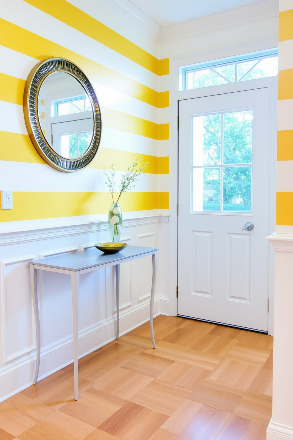 A bright and inviting foyer features yellow and white striped wallpaper that adds a cheerful touch to the space. The floor is adorned with a light-colored hardwood, complemented by a stylish console table against one wall. A large round mirror with a gold frame hangs above the console table, reflecting natural light from a nearby window. Decorative elements such as a vase with fresh flowers and a small bowl for keys enhance the welcoming atmosphere of the foyer.