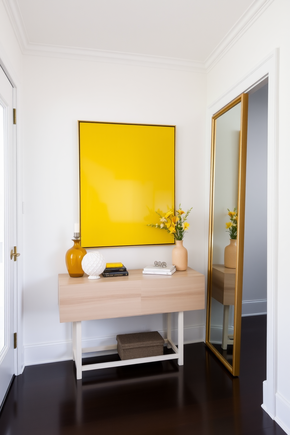 A bright foyer filled with sunshine yellow artwork that serves as a vibrant focal point. The walls are painted in a soft white to enhance the brightness, creating an inviting atmosphere. A sleek console table in a light wood finish sits against the wall, adorned with decorative items in complementary colors. A large mirror with a gold frame reflects the artwork, adding depth and elegance to the space.