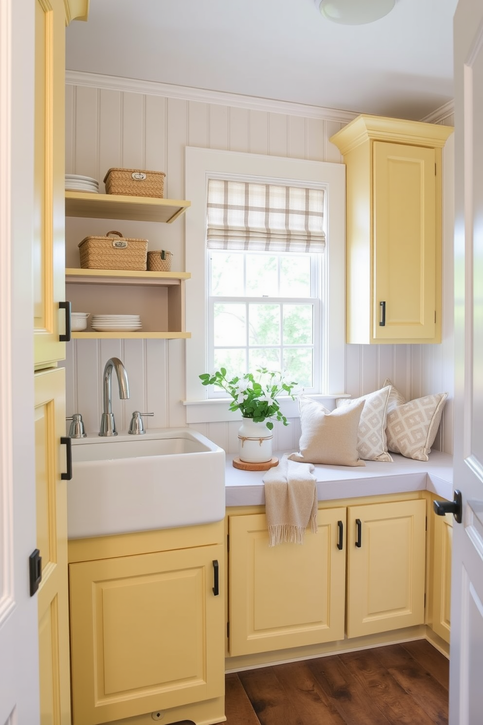 Cottage style yellow cabinets with beadboard create a cheerful and inviting atmosphere in the laundry room. The space features a farmhouse sink, open shelving for easy access to laundry essentials, and a cozy window seat adorned with soft cushions.