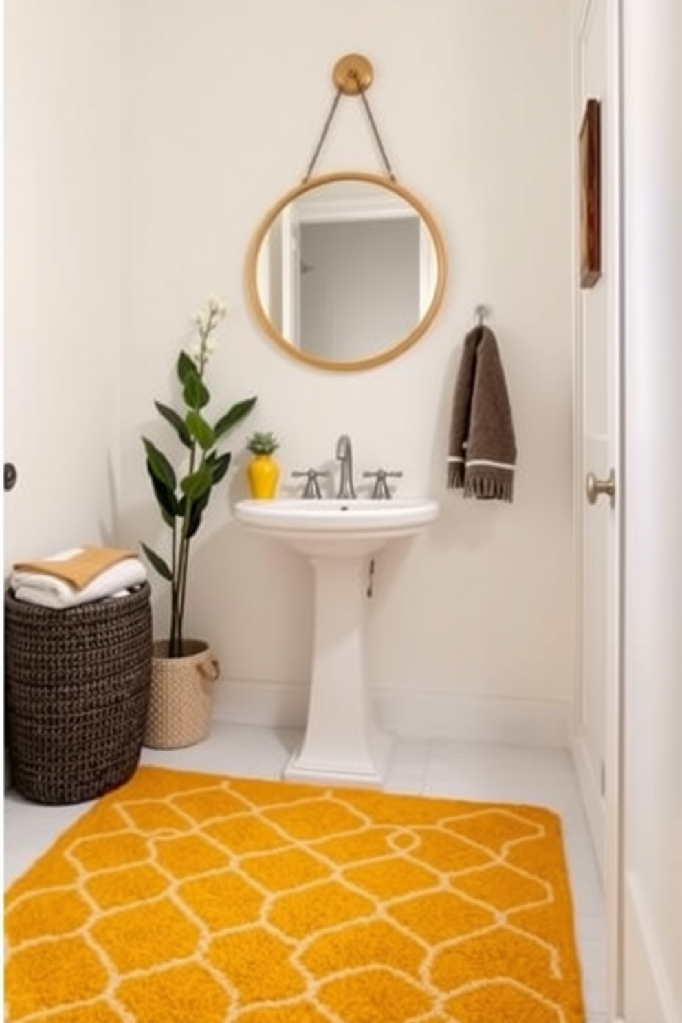 A vibrant yellow rug covers the floor of a cozy powder room, adding a pop of color and comfort to the space. The walls are painted in a soft white, creating a bright and airy atmosphere that complements the cheerful rug. The powder room features a sleek pedestal sink with a modern faucet, and a round mirror framed in brushed gold hangs above it. Decorative accents like a small potted plant and stylish hand towels in coordinating colors enhance the inviting feel of the room.