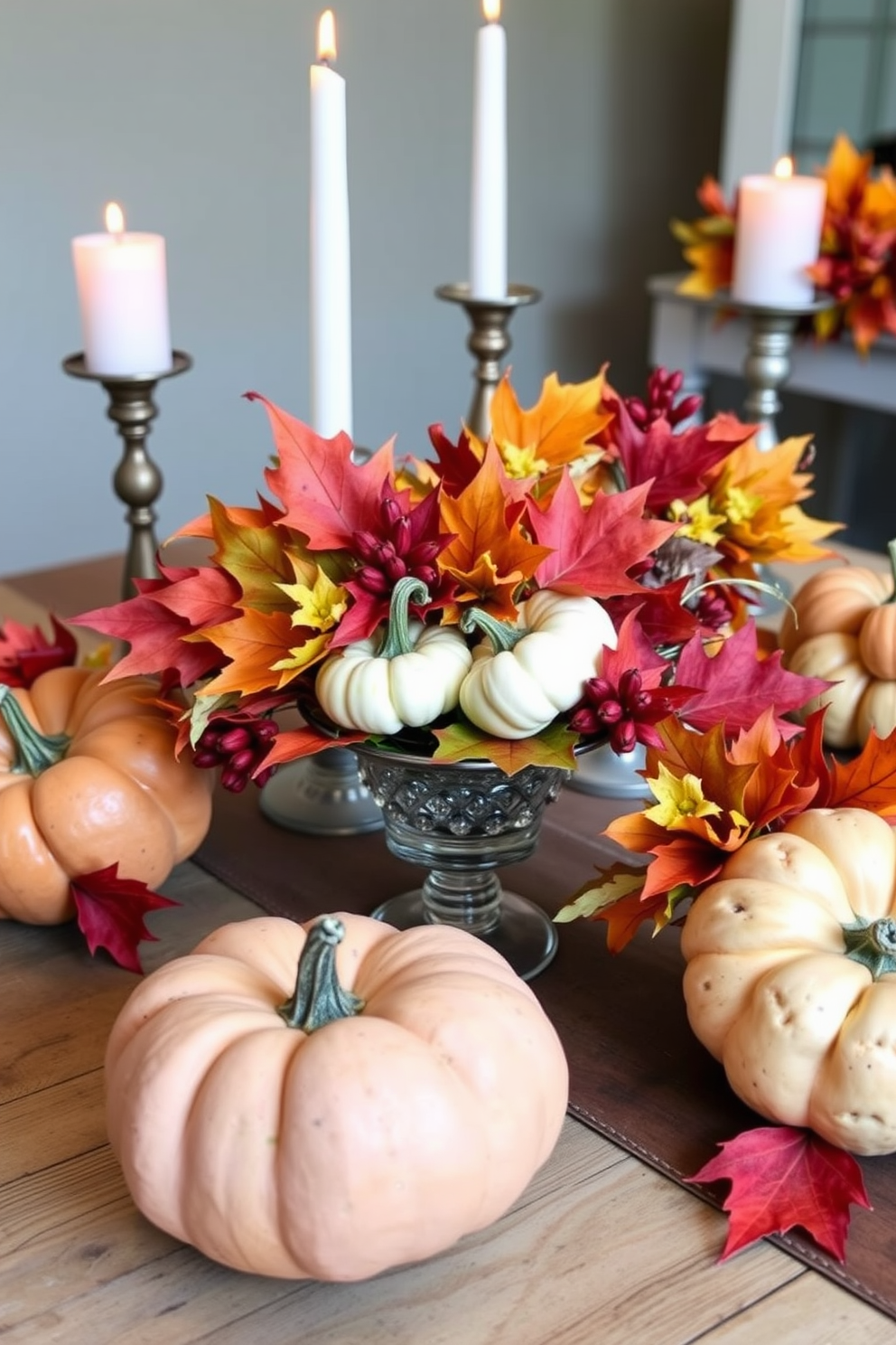 A collection of simple centerpieces featuring an assortment of colorful gourds and vibrant autumn leaves. The arrangement is displayed on a rustic wooden table, complemented by soft candlelight to create a warm and inviting atmosphere.