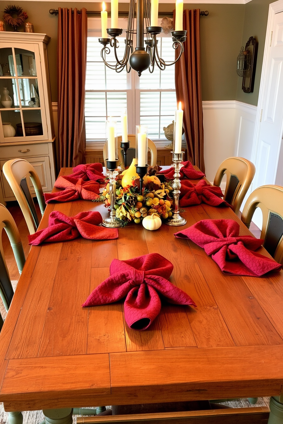 Textured napkins in rich fall hues are elegantly arranged on a rustic wooden dining table. Surrounding the table are mismatched vintage chairs, each showcasing unique colors and patterns that complement the autumn theme. A centerpiece of seasonal fruits and candles adds warmth and charm to the setting. Soft lighting from a nearby chandelier casts a cozy glow, enhancing the inviting atmosphere of the fall dining room.