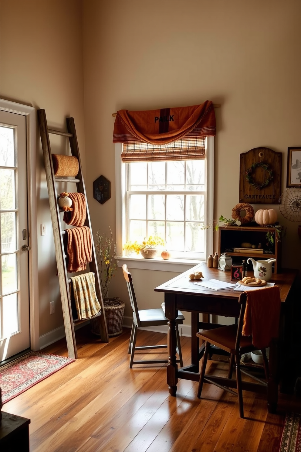 A cozy fall home office features a vintage ladder leaning against a wall, adorned with warm-toned blankets and seasonal decorations. A rustic wooden desk sits beneath a large window, allowing natural light to illuminate the space filled with autumn-inspired decor.