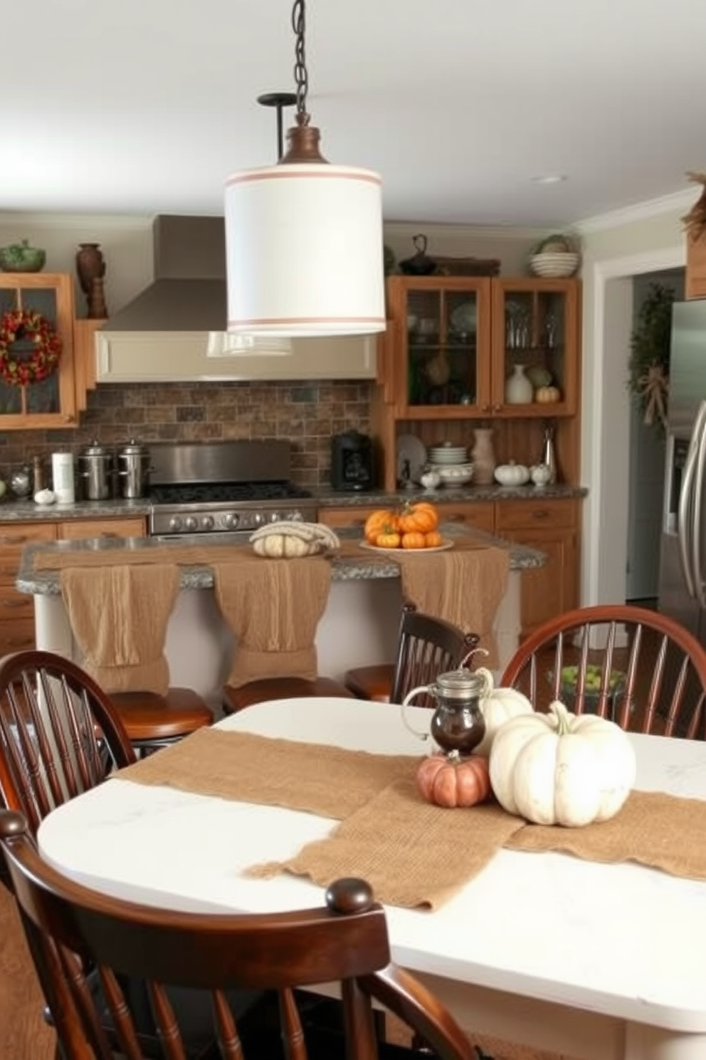 A cozy fall kitchen filled with rustic charm. Burlap accents adorn the space, including table runners and decorative pillows, adding warmth to the wooden dining chairs. The countertops are decorated with seasonal produce, showcasing pumpkins and gourds in earthy tones. Soft lighting illuminates the room, creating an inviting atmosphere perfect for family gatherings.