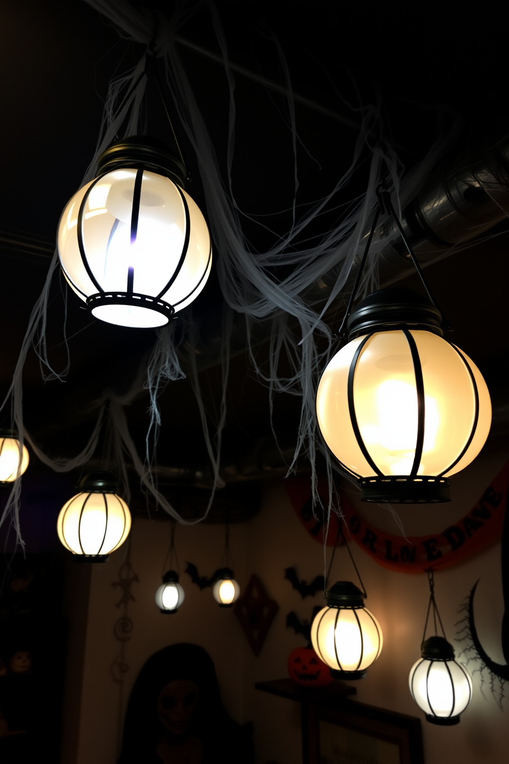 Hanging lanterns with flickering lights create an enchanting atmosphere in a Halloween-themed basement. The space is adorned with cobwebs and spooky decorations, while the soft glow of the lanterns casts eerie shadows on the walls.