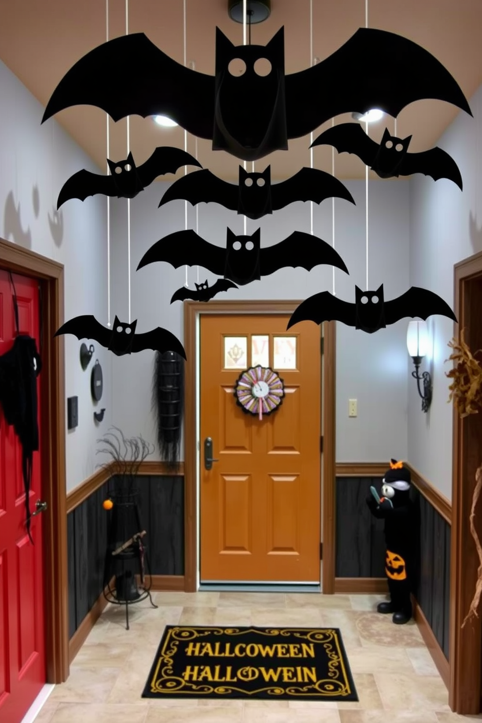 A whimsical Halloween entryway features DIY paper bats suspended from the ceiling, creating a playful atmosphere. The walls are adorned with spooky-themed decorations, while a welcome mat with a festive design greets guests at the door.