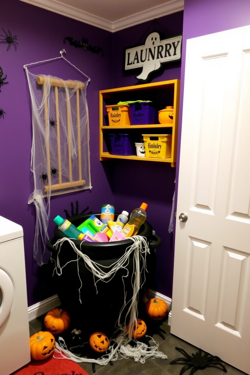 A whimsical laundry room setting inspired by Halloween. A large cauldron filled with colorful laundry supplies sits in the corner, surrounded by spooky decorations like cobwebs and plastic spiders. The walls are painted in a deep purple hue, creating a festive atmosphere. Shelves are adorned with Halloween-themed storage bins, and a ghostly laundry sign hangs above the cauldron.