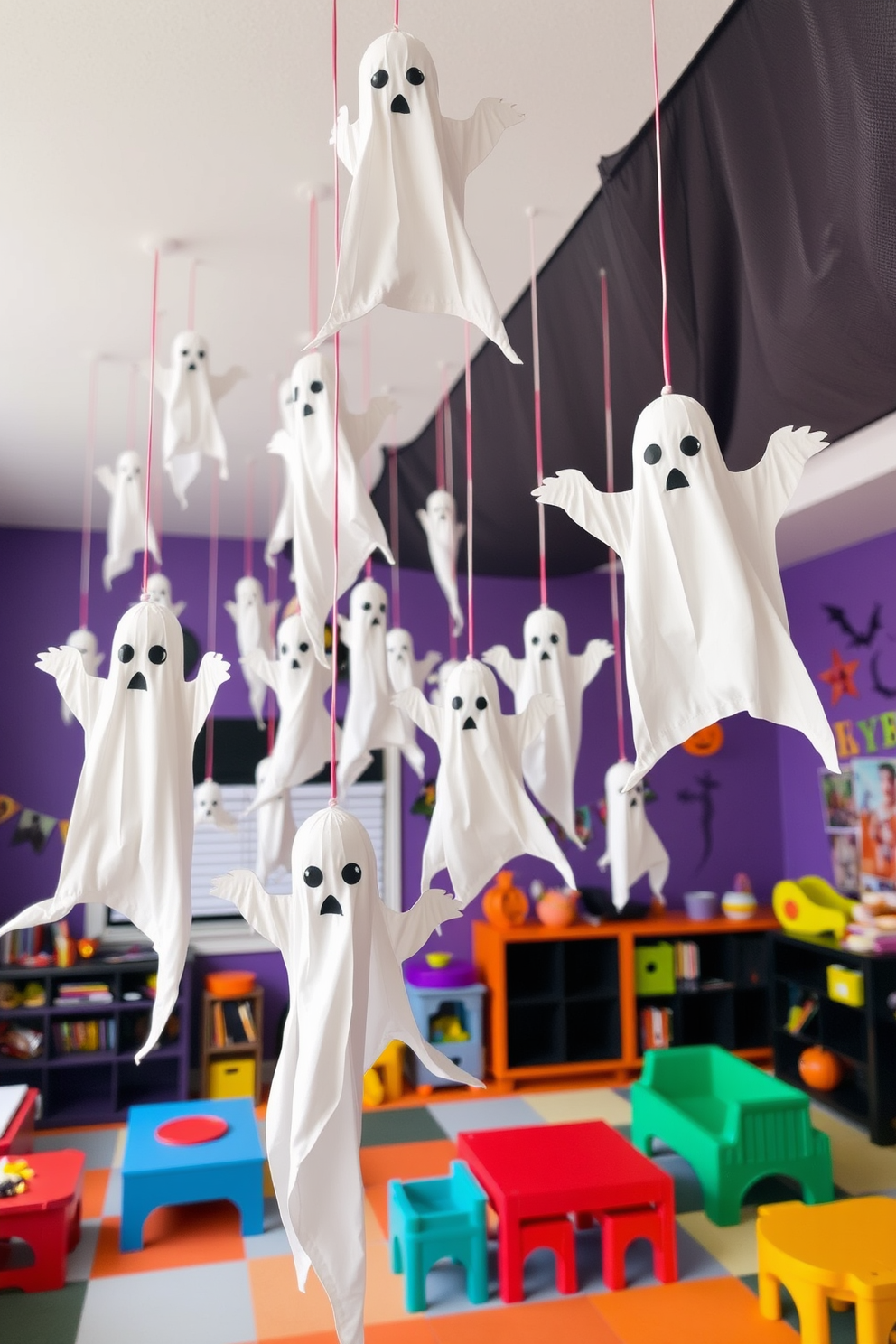 Hanging ghost decorations drift from the ceiling, creating a whimsical and spooky atmosphere perfect for Halloween. The playroom is filled with vibrant colors and playful furniture, inviting children to engage in imaginative play while surrounded by festive decor.