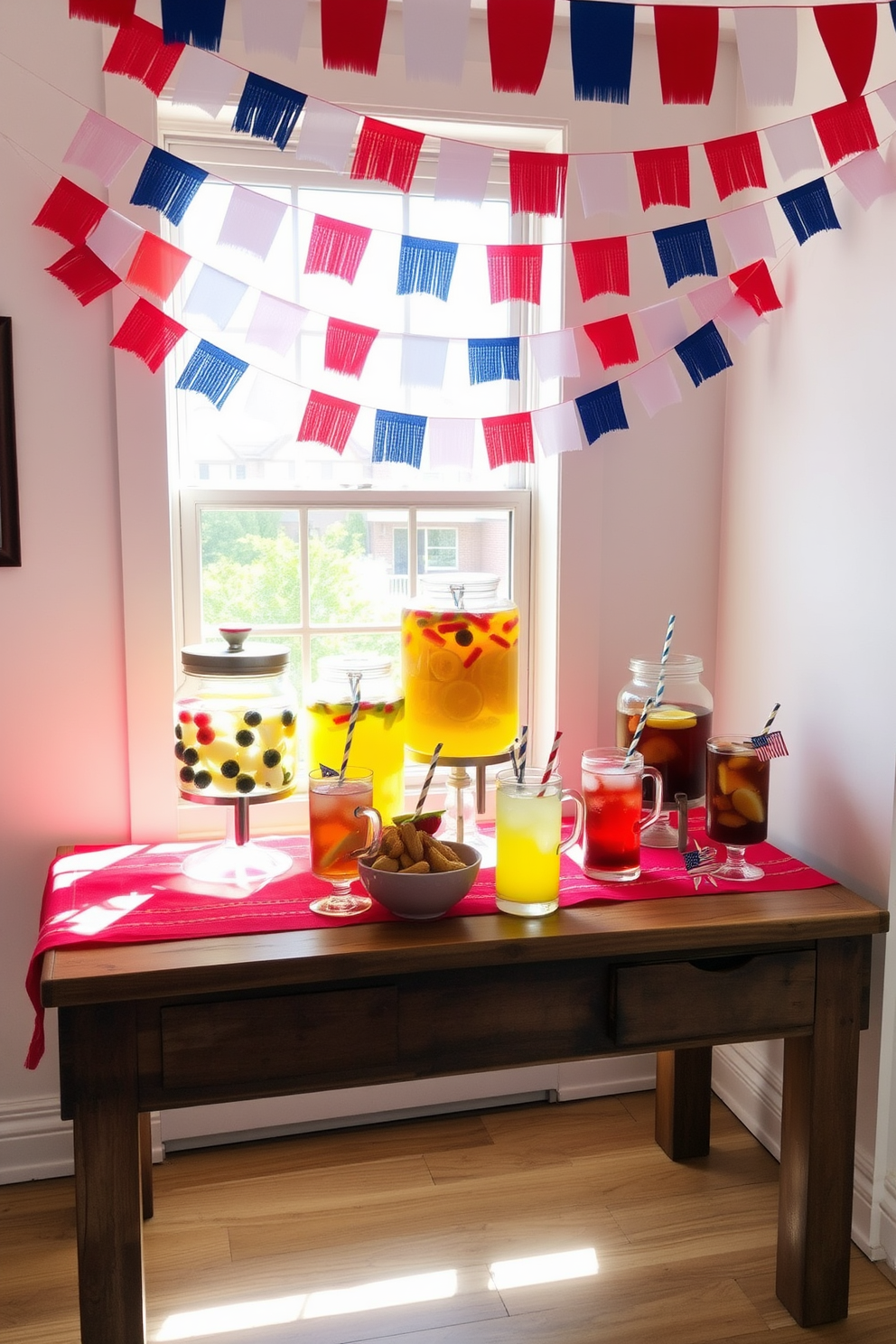 A festive drink station is set up in a bright corner of the apartment, featuring a rustic wooden table adorned with a vibrant red tablecloth. Colorful flags in red, white, and blue are strung overhead, creating a celebratory atmosphere for Independence Day. The table is decorated with an assortment of drinks in glass dispensers, including lemonade and iced tea, surrounded by fresh fruit garnishes. Red and blue paper straws are placed in each drink, while small decorative stars and stripes accents add to the festive theme.