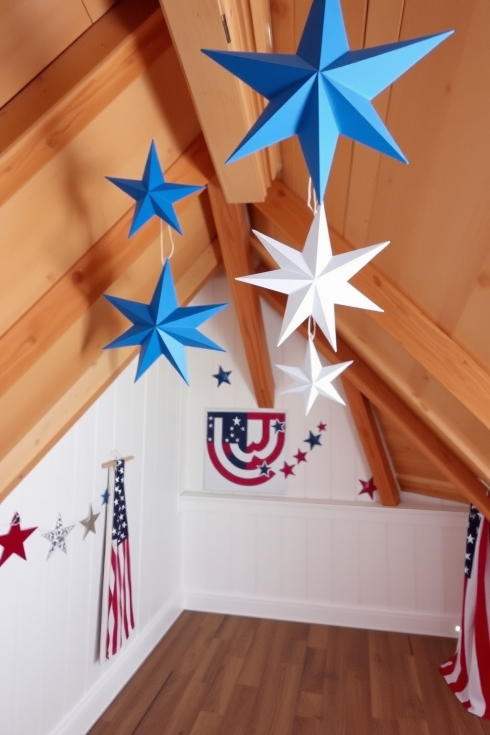 A cozy attic space decorated for Independence Day features wooden ceiling beams adorned with decorative stars in red white and blue. The walls are painted in a soft white hue and the floor is covered with a rustic wooden finish.