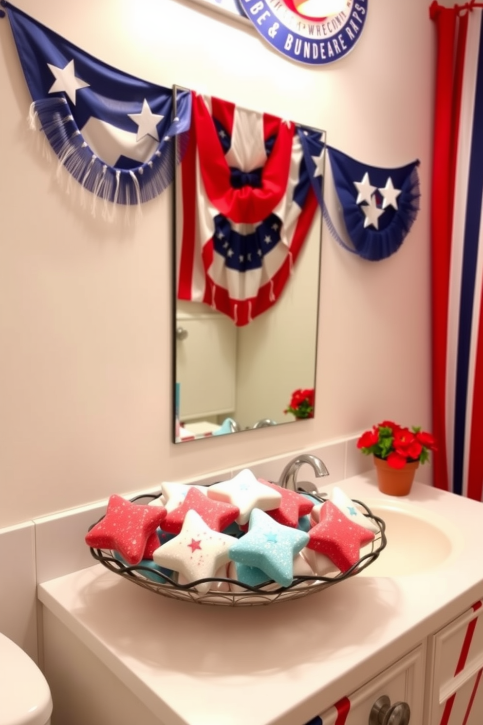 A vibrant bathroom setting celebrating Independence Day. Star shaped bath bombs in red white and blue are arranged in a decorative bowl on the countertop. The walls are adorned with festive bunting featuring stars and stripes. A small potted plant with red flowers adds a pop of color next to the sink.