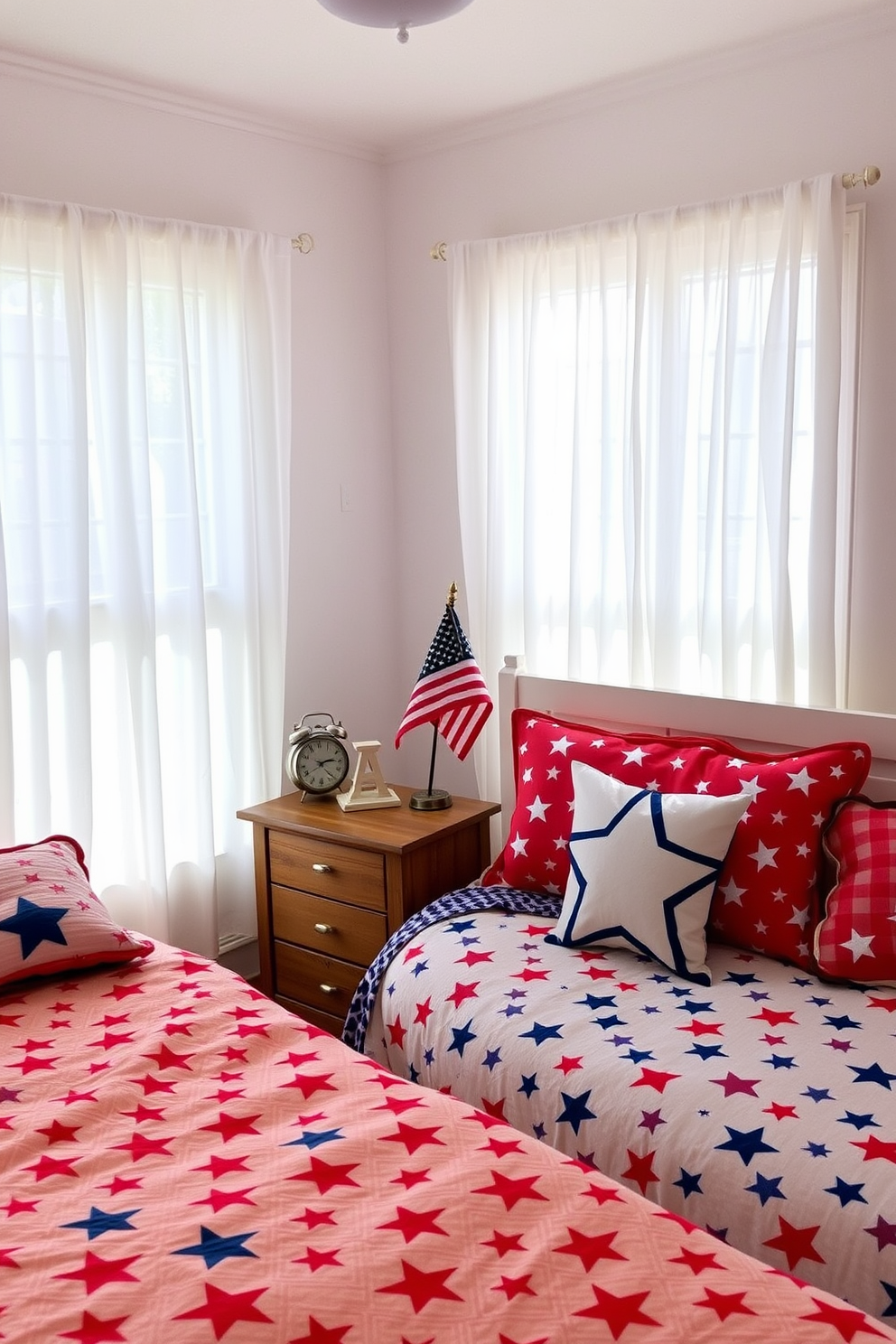 A vibrant bedroom setting adorned with star patterned bedspreads in red white and blue hues. The bed is centered against a soft white wall and accented with decorative pillows featuring stars and stripes. A rustic wooden nightstand sits beside the bed holding a small American flag and a vintage alarm clock. The windows are dressed with sheer white curtains allowing natural light to flood the room creating a festive and cheerful atmosphere.