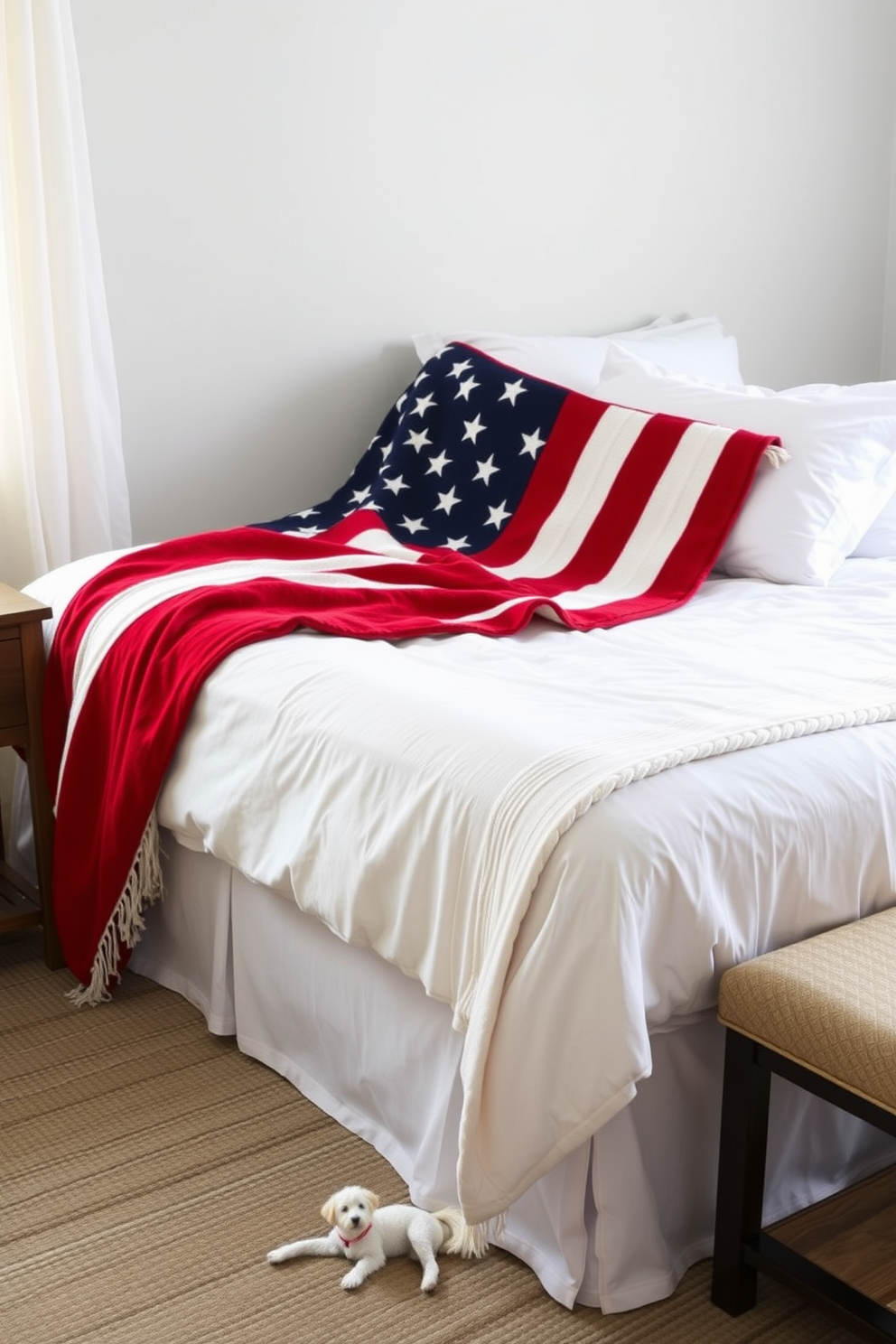 Cozy throw blankets in vibrant flag colors are draped elegantly across the bed, adding a festive touch to the room. The bed is adorned with crisp white linens, creating a striking contrast with the colorful blankets that celebrate Independence Day.