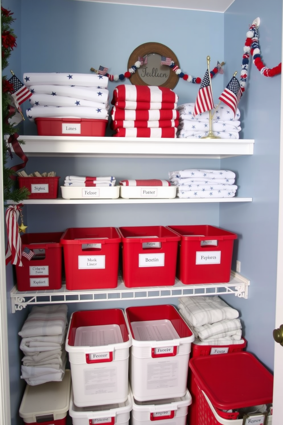 A festive closet designed for storing holiday linens with a patriotic theme. The walls are painted in a soft blue, and red and white storage bins are neatly arranged on shelves, labeled for easy access. A charming display of folded linens featuring stars and stripes is visible on the top shelf. Decorative elements like small American flags and themed garlands add a touch of celebration to the space.