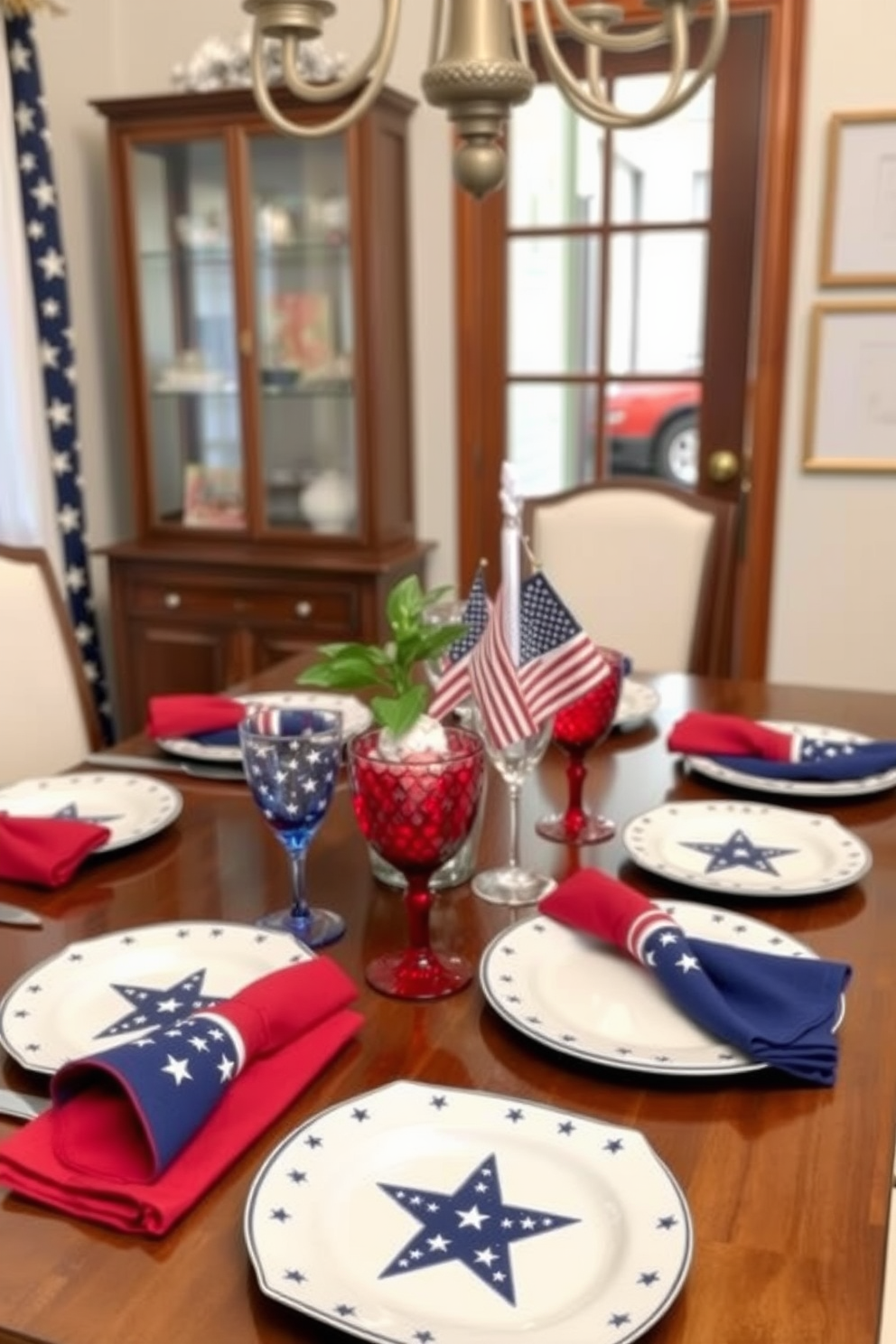 A festive dining room setting featuring a red white and blue themed dinnerware set. The table is beautifully arranged with plates adorned with stars and stripes, complemented by matching napkins and glassware.