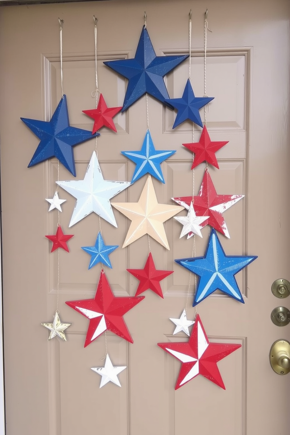 A festive front door adorned with hanging stars made from recycled wood. The stars vary in size and are painted in red white and blue to celebrate Independence Day.