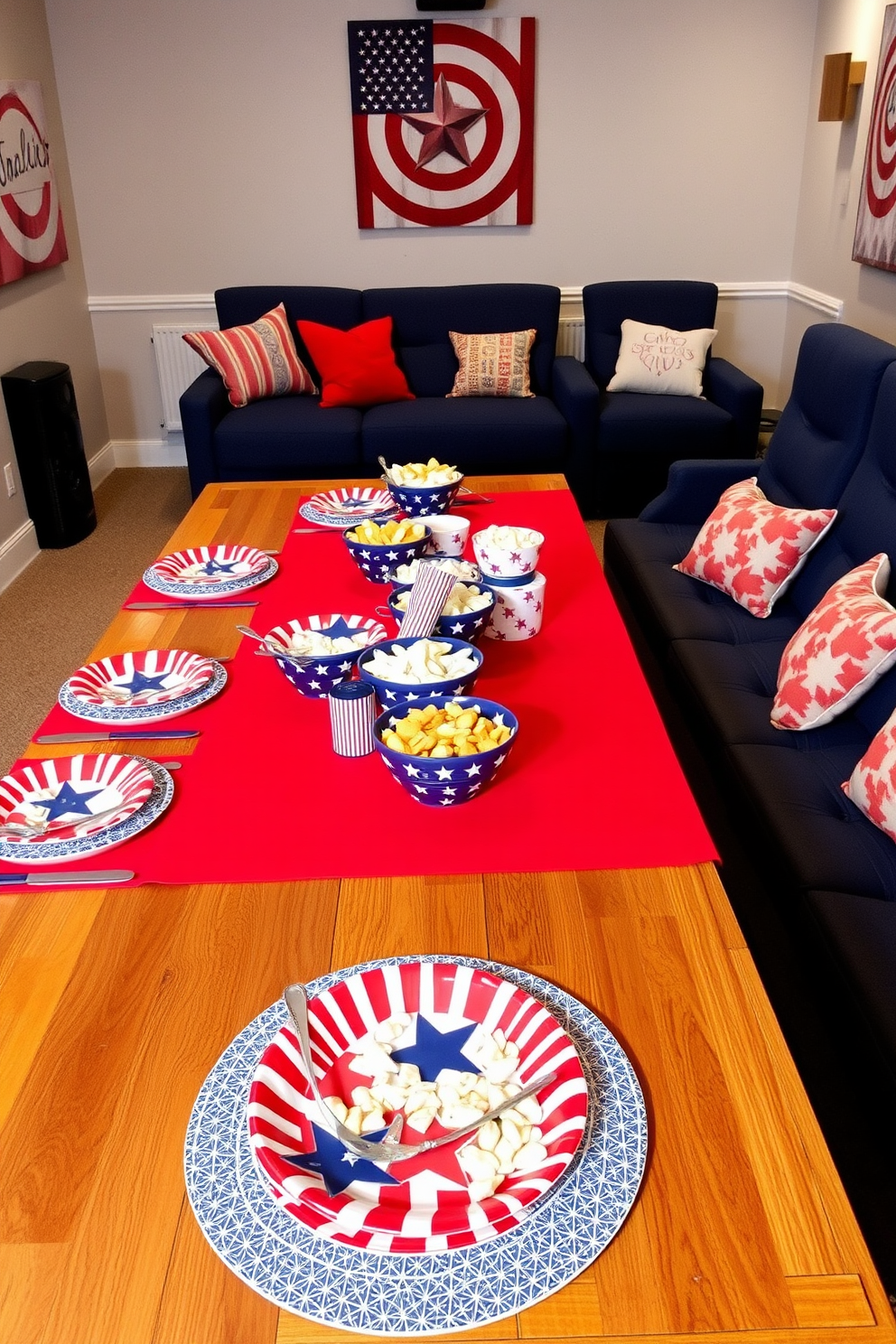 Star spangled tableware is set up on a long wooden table adorned with a vibrant red tablecloth. The table features plates and napkins decorated with stars and stripes, complemented by an array of colorful snacks in themed bowls. The home theater is designed with plush seating in navy blue, creating a cozy atmosphere for movie nights. Red, white, and blue decorative accents, including throw pillows and wall art, enhance the festive Independence Day spirit.