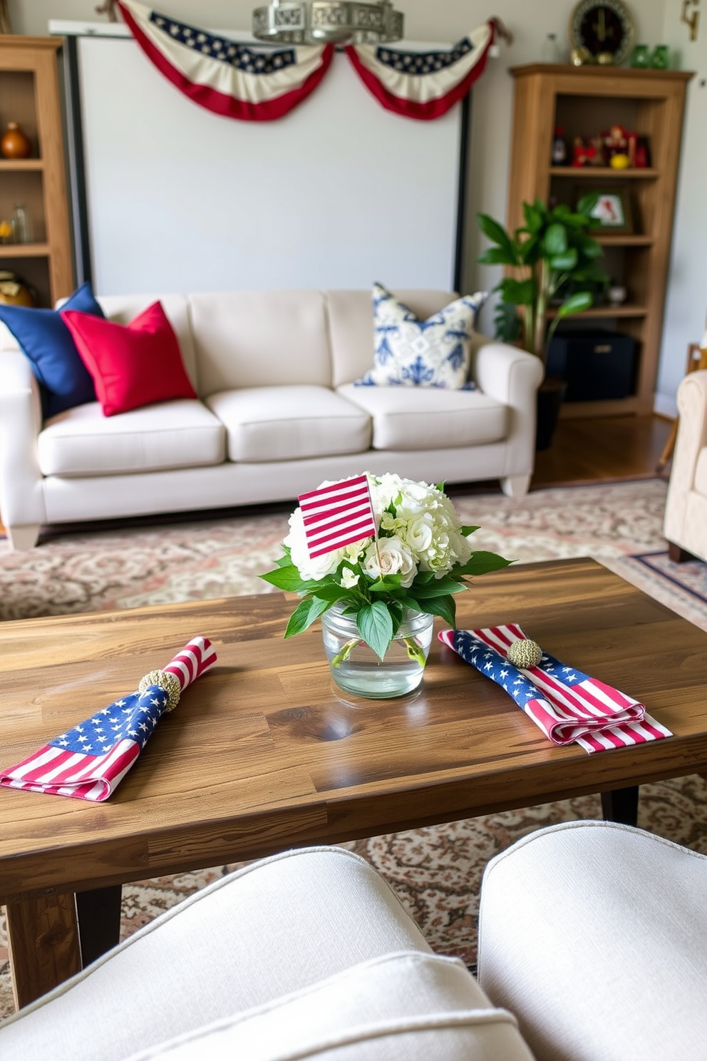 Create a cozy home theater setting designed for an Independence Day celebration. Themed napkins featuring stars and stripes are elegantly arranged on a rustic wooden coffee table surrounded by plush seating.