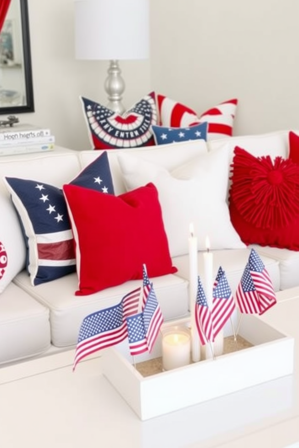 Create a vibrant living room setting adorned with red white and blue throw pillows to celebrate Independence Day. The pillows are arranged on a plush white sofa, complemented by a patriotic-themed coffee table centerpiece featuring small flags and candles.