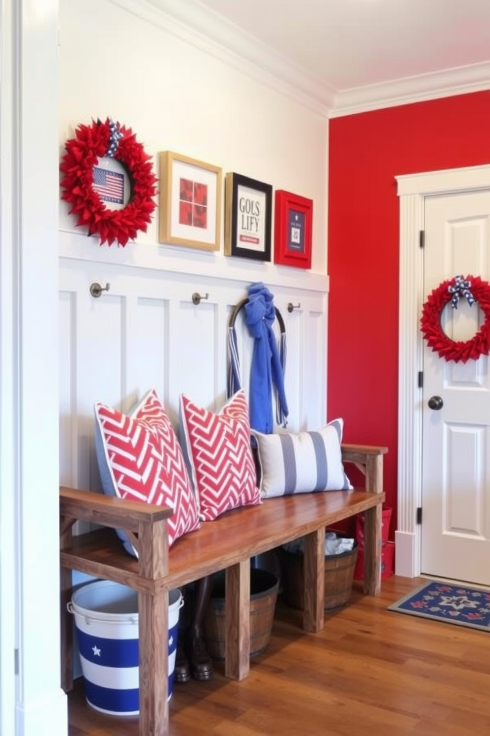 A vibrant mudroom decorated in a red white and blue color scheme to celebrate Independence Day. The walls are painted in a crisp white with bold red and blue accents in the decor and furnishings. A rustic wooden bench is placed against one wall, adorned with red and blue patterned cushions. Above the bench, a series of framed patriotic art pieces add a festive touch to the space.