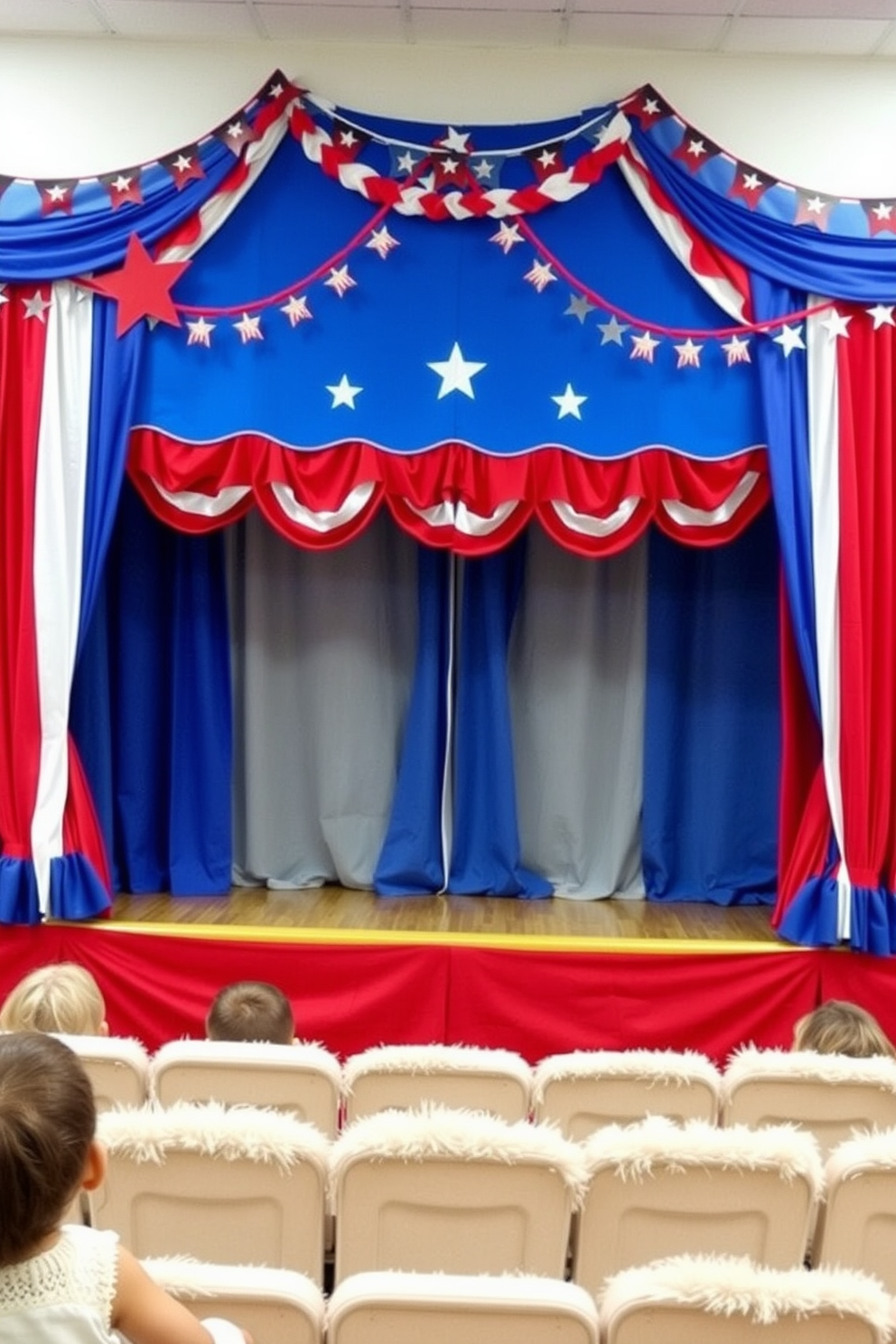 A vibrant puppet show stage is set up for an Independence Day theme. Red, white, and blue decorations adorn the backdrop, featuring stars and stripes along with festive bunting. The stage is framed by colorful curtains that create a whimsical atmosphere. Plush seating is arranged in front of the stage, inviting children to enjoy the performance in a cozy and engaging environment.