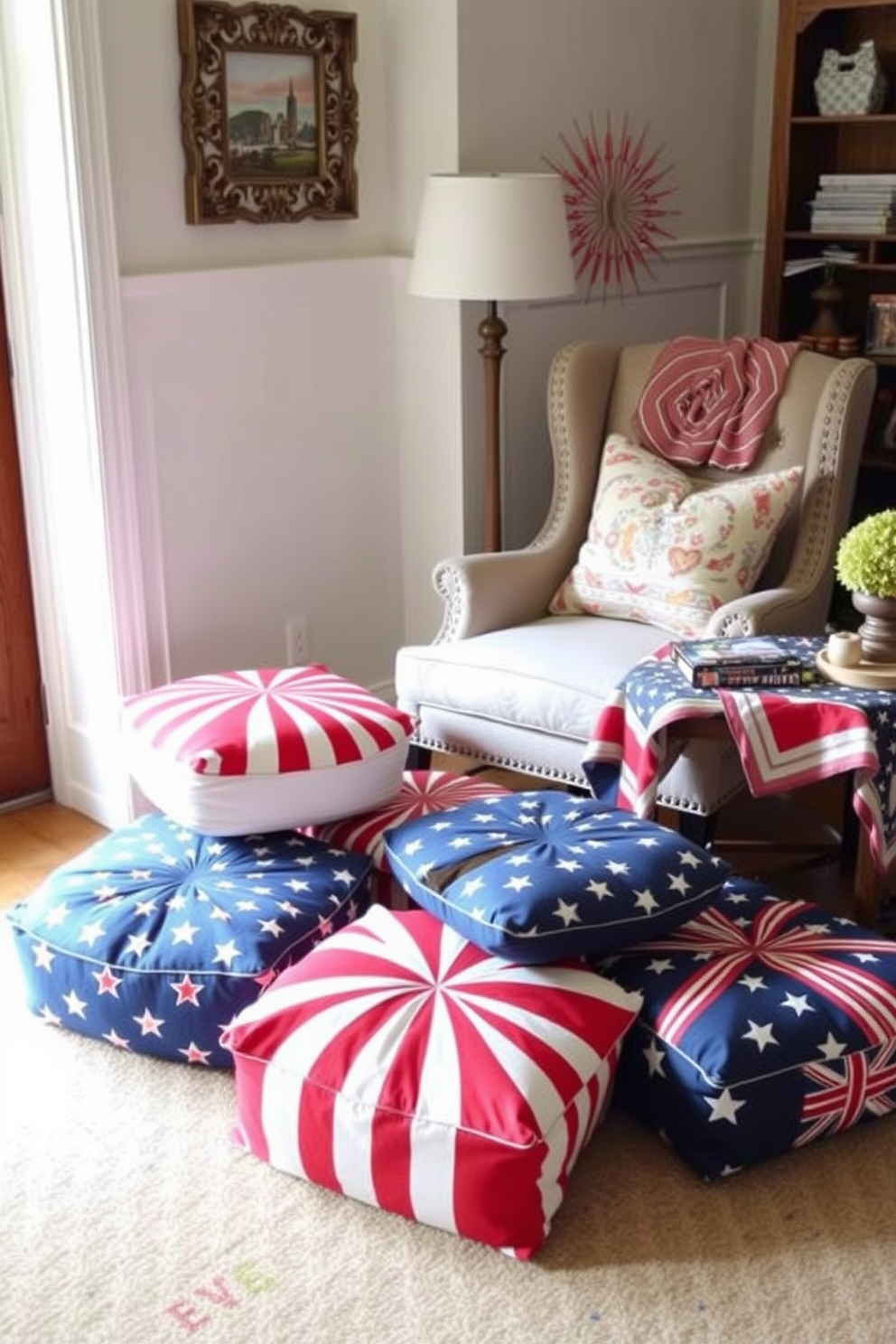 Patriotic themed floor poufs are arranged in a cozy reading nook, featuring vibrant red, white, and blue patterns that celebrate Independence Day. A comfortable armchair sits nearby, complemented by a small side table adorned with a festive tablecloth and a stack of books.