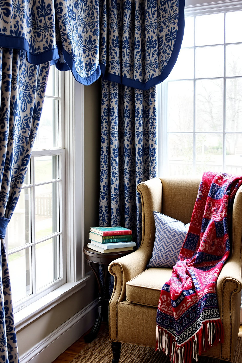 A cozy reading nook adorned with blue and white patterned curtains that gently frame a large window. A comfortable armchair sits in the corner, accompanied by a small side table holding a stack of books and a festive red, white, and blue throw blanket.