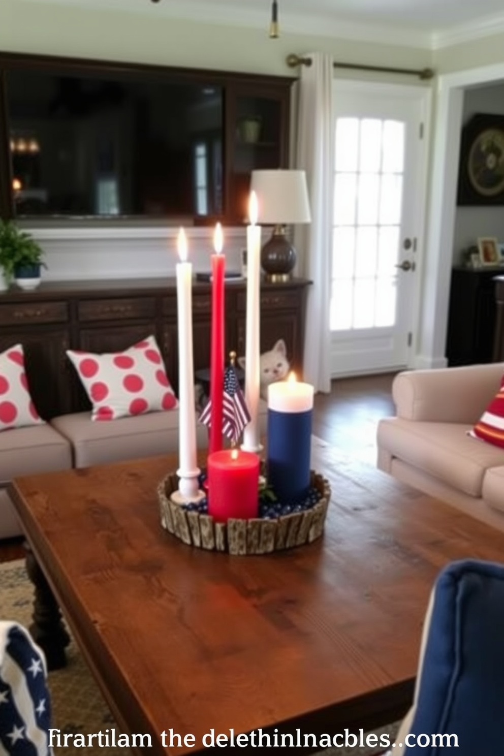 A small living room decorated for Independence Day features a patriotic themed candle arrangement. Red white and blue candles of varying heights are placed on a rustic wooden coffee table surrounded by comfortable seating.