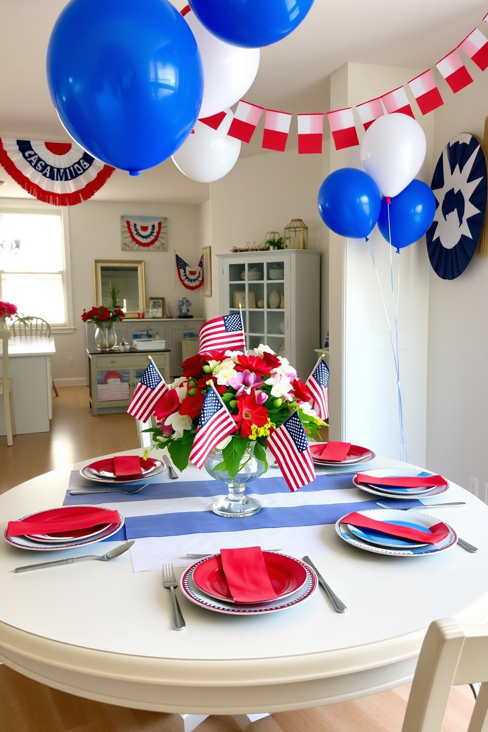 A festive dining table is adorned with flag-themed table settings featuring red white and blue plates and napkins. Centered on the table is a vibrant floral arrangement with seasonal blooms and small American flags. The apartment is decorated for Labor Day with patriotic accents throughout the space. Banners and balloons in red white and blue hang from the ceiling creating a cheerful atmosphere.