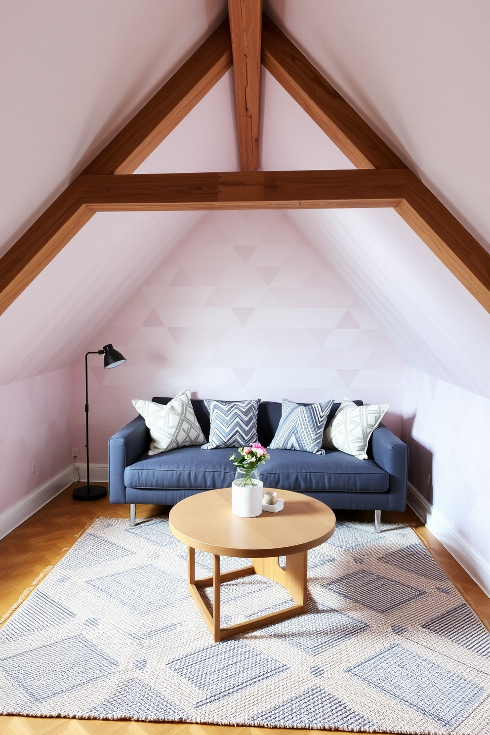 A cozy attic space transformed into a stylish retreat. The walls are adorned with geometric wallpaper in soft pastel tones, creating a playful yet sophisticated atmosphere. A plush seating area features a modern sofa with geometric patterned cushions. A round coffee table with a unique shape sits atop a textured area rug, adding warmth to the space.