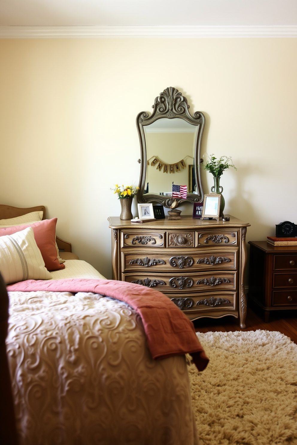 A charming bedroom featuring a vintage dresser with intricate carvings and a distressed finish. The dresser is adorned with a vintage mirror and a small collection of decorative items, creating a warm and inviting atmosphere. The walls are painted in a soft pastel color, complemented by cozy bedding in earthy tones. A plush area rug lies beneath the bed, adding texture and comfort to the space while enhancing the overall Labor Day decorating theme.