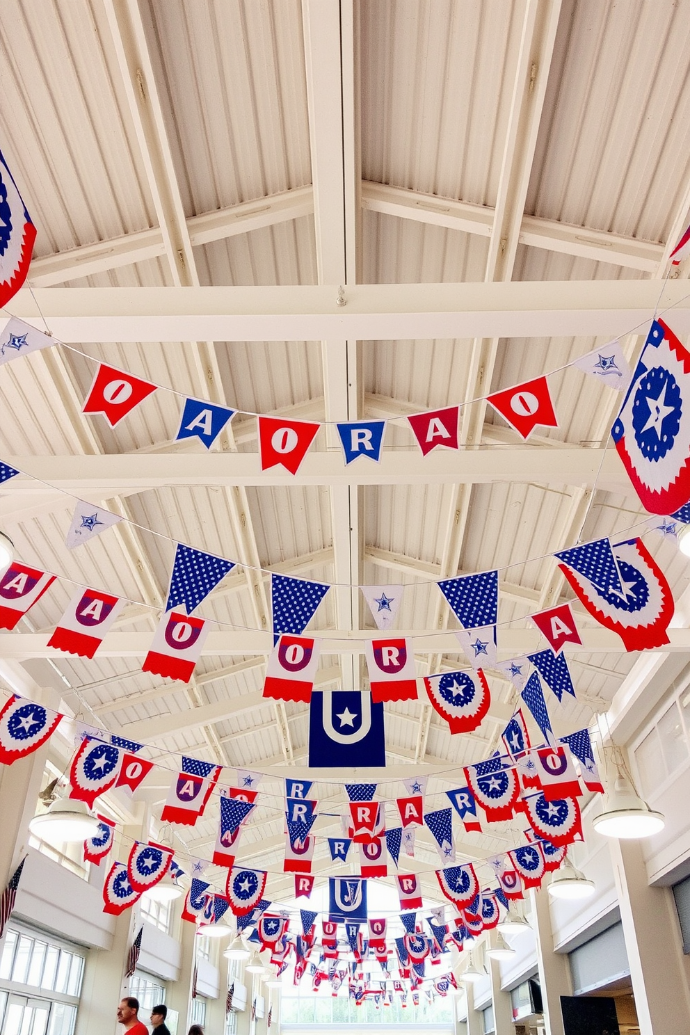 A vibrant indoor space adorned with colorful festive banners hanging from the ceilings. The banners feature a mix of red, white, and blue designs, celebrating Labor Day with a cheerful and inviting atmosphere.