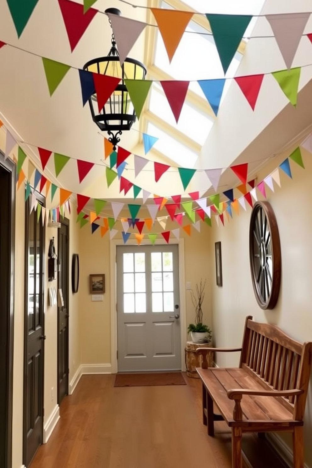 A festive entryway adorned with colorful bunting flags hanging from the ceiling. The walls are painted in a warm cream color, and a rustic wooden bench sits against one side, inviting guests to sit and remove their shoes.