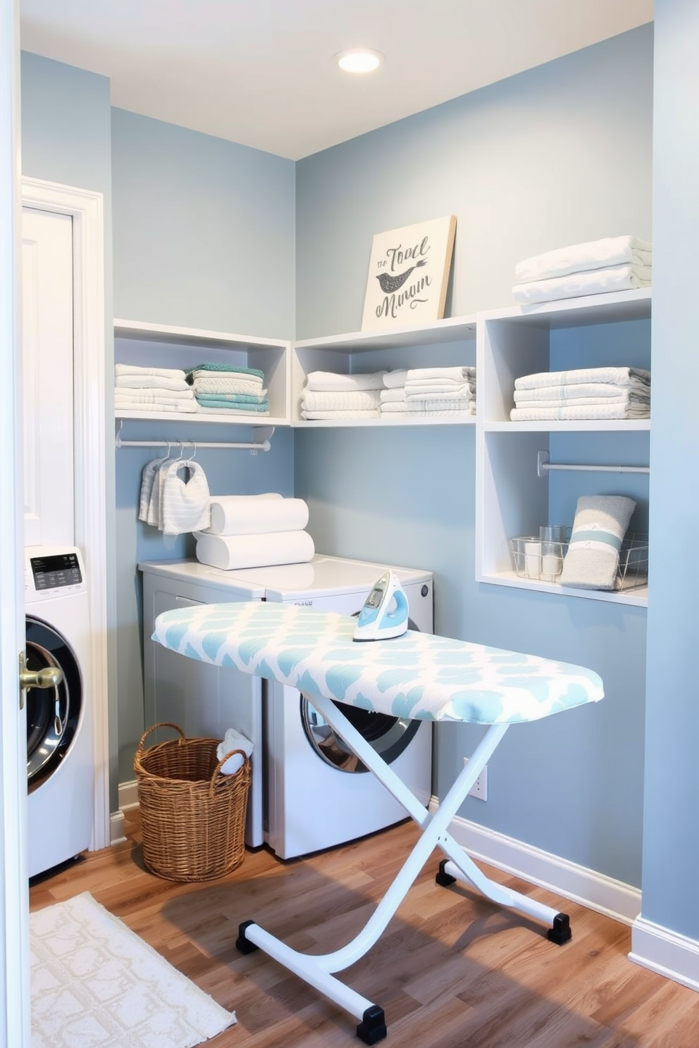 A stylish laundry room features a modern ironing board with a chic cover that complements the overall decor. The walls are painted in a soft blue hue, and the space is organized with open shelves displaying neatly folded towels and laundry essentials. A whimsical wall art piece adds character to the room, while a wicker basket sits in the corner for sorting clothes. The flooring is a durable laminate that mimics the look of hardwood, providing both style and functionality.