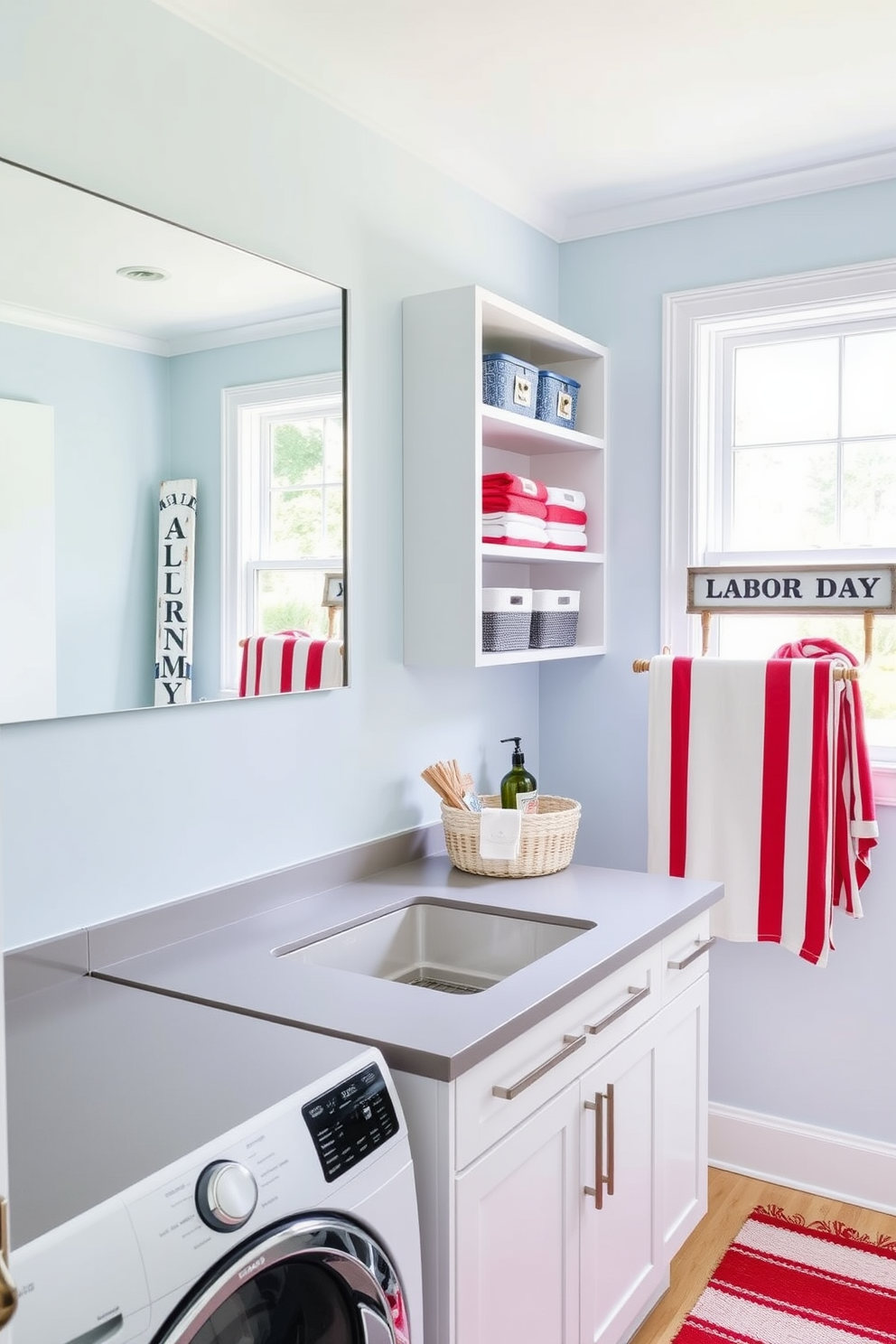 A bright and functional laundry room features a large mirror hung above a sleek countertop, reflecting the natural light coming through a nearby window. The walls are painted in a soft blue hue, creating a calming atmosphere, while open shelving displays neatly folded towels and decorative storage bins. Incorporate Labor Day themed decor with subtle accents like a red and white striped rug and a vintage laundry sign. A stylish drying rack made of reclaimed wood adds both practicality and charm to the space.