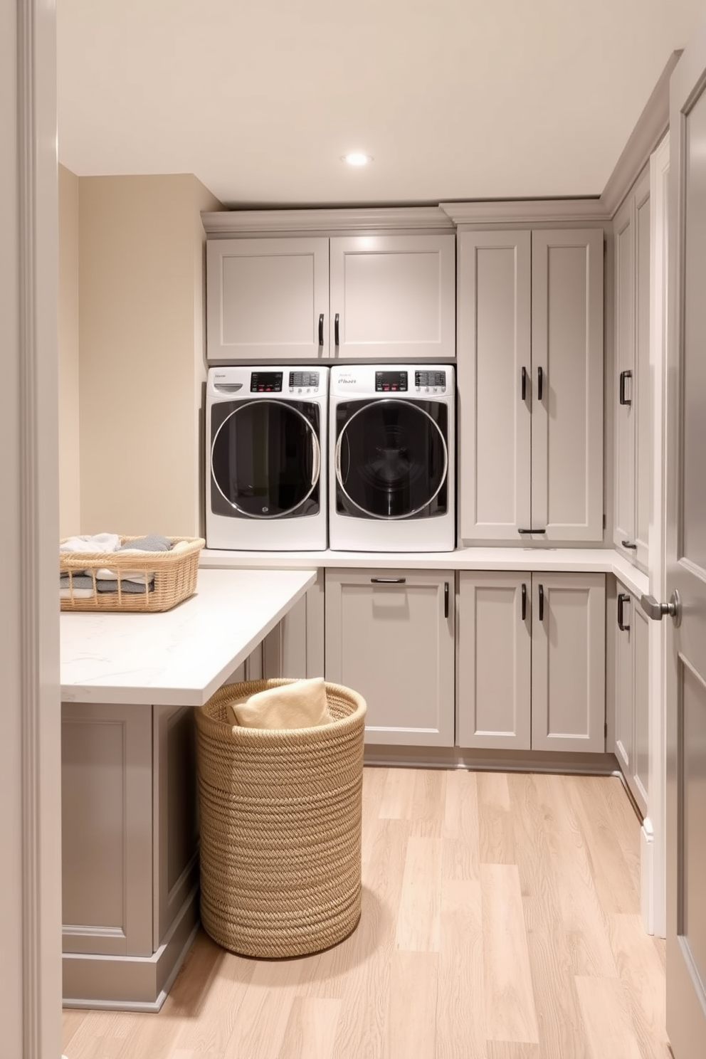 A serene laundry room designed with a neutral color palette that promotes calmness. The walls are painted in soft beige, and the cabinetry features a light gray finish for a cohesive look. Incorporate a spacious countertop made of white quartz for folding clothes, paired with a stylish laundry basket in natural fibers. The floor is adorned with light wood planks, creating warmth and inviting comfort in the space.