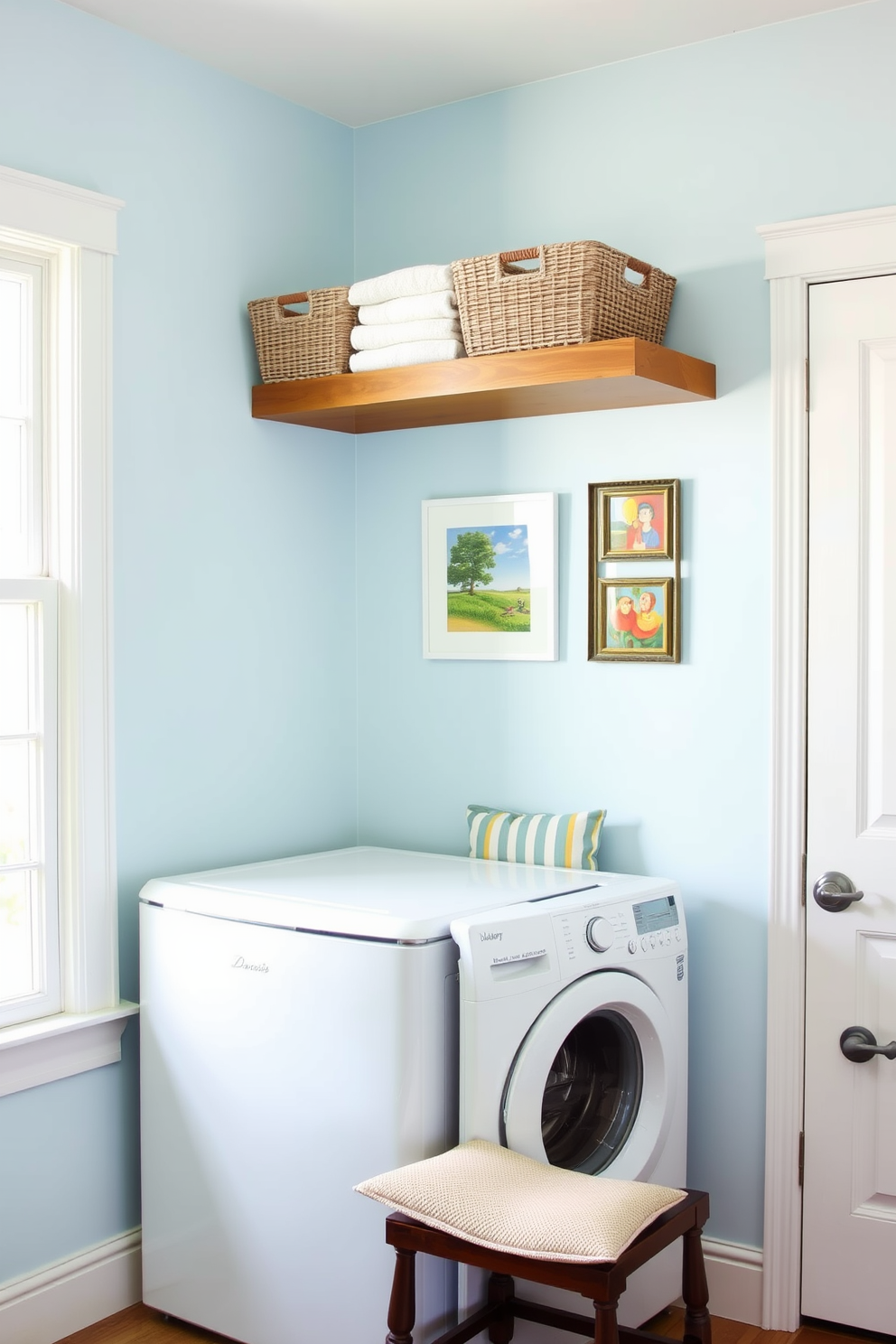 A bright and airy laundry room featuring a large window that lets in natural light. The walls are painted in a soft blue hue, and a wooden shelf above the washer and dryer holds neatly folded towels and decorative baskets. Hang a collection of colorful framed artwork on the walls to add a personal touch. Below the artwork, a small bench with cushions provides a cozy spot for folding laundry.