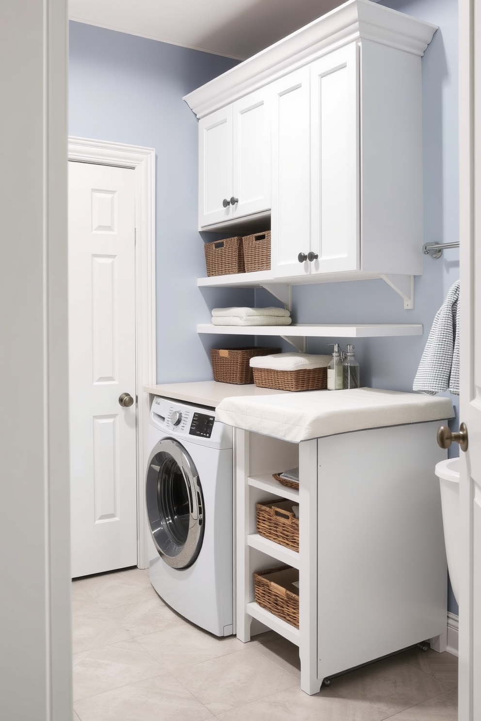 A stylish laundry room featuring a practical folding station with ample storage space. The walls are painted in a soft blue hue, and the floor is adorned with light gray tiles for a clean look.