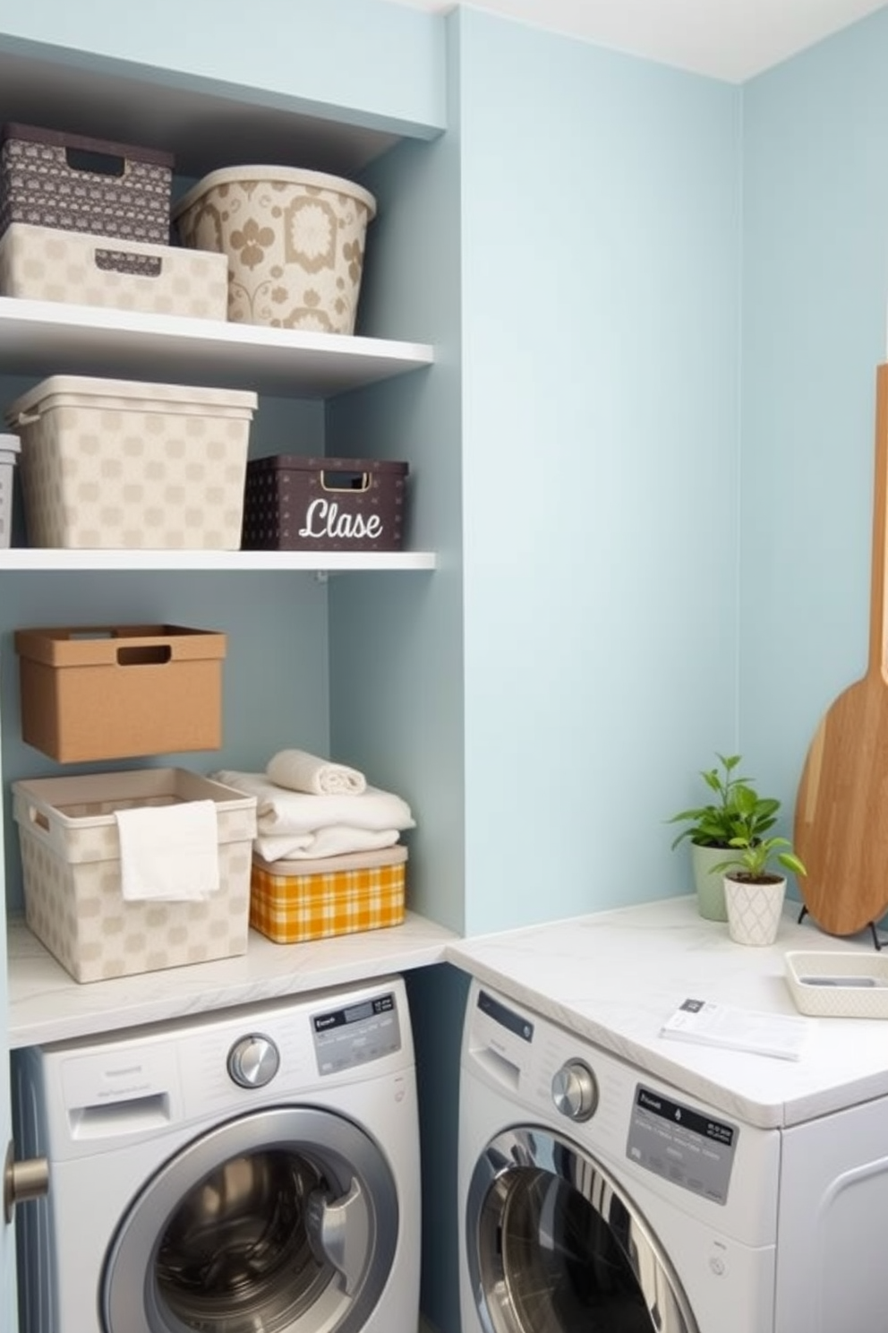 A cozy laundry room featuring decorative storage bins in various sizes and colors arranged neatly on open shelves. The walls are painted in a soft blue hue, and a stylish countertop is utilized for folding clothes, adorned with a small potted plant for a touch of greenery.