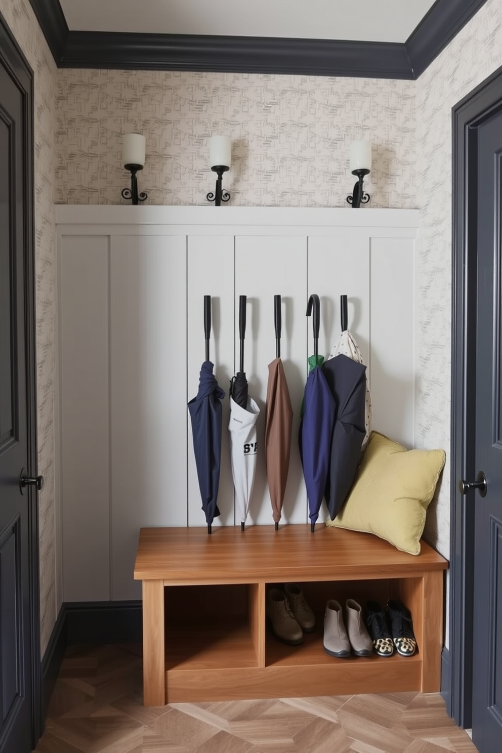 A stylish mudroom designed for functionality and aesthetics. The space features a row of elegant umbrella stands in various colors, providing easy access for rainy days. The walls are adorned with a subtle wallpaper pattern that complements the overall decor. A wooden bench with storage underneath offers a practical seating area for putting on shoes.