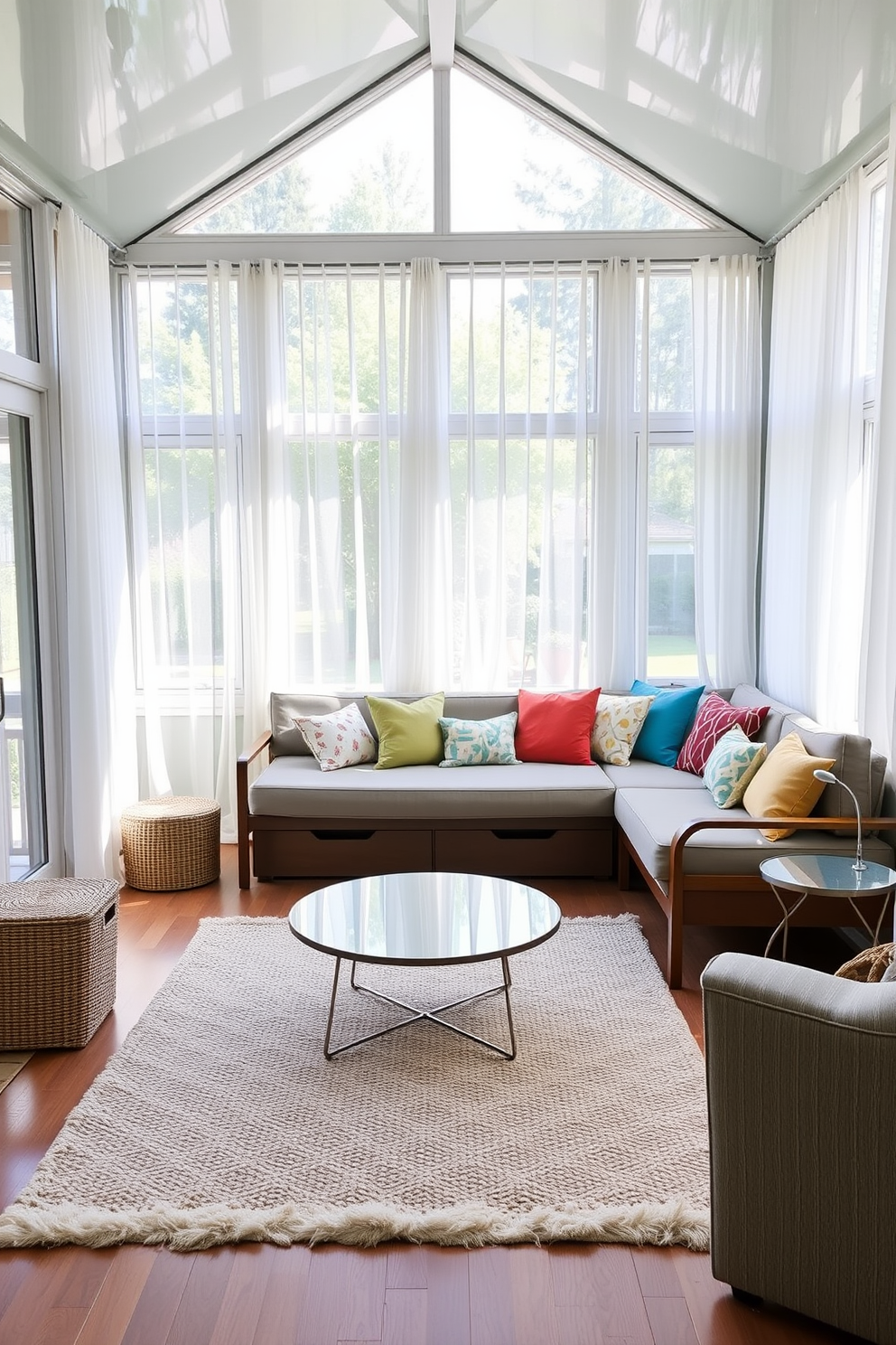 A sunroom filled with natural light featuring multi-functional furniture pieces. A stylish daybed serves as both a seating area and a sleeping space, adorned with colorful cushions. A sleek coffee table with hidden storage sits in the center, surrounded by a cozy rug. Large windows framed with sheer curtains allow for a view of the outdoors while maintaining privacy.