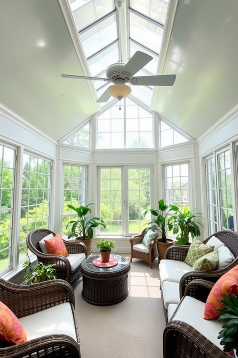 A bright and airy sunroom with large windows allowing natural light to flood the space. The ceiling fan is elegantly installed in the center, providing a refreshing airflow on warm days. The decor features a mix of comfortable wicker furniture adorned with soft cushions in vibrant colors. Potted plants are strategically placed around the room, adding a touch of greenery and life to the inviting atmosphere.