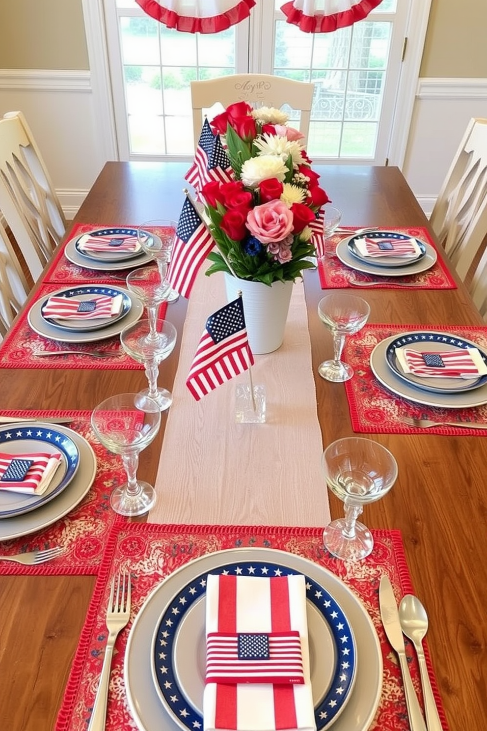 Create a vibrant dining setting featuring red white and blue themed placemats that celebrate Memorial Day. The table is set with matching dinnerware and decorative centerpieces that incorporate patriotic elements like small flags and seasonal flowers.