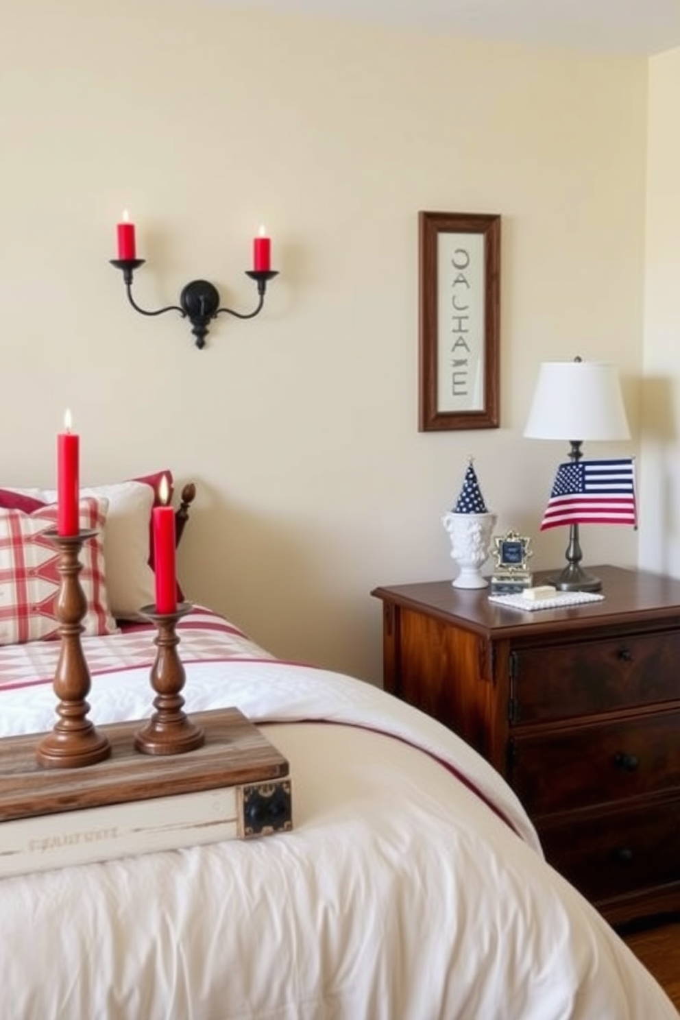 A cozy bedroom adorned with candle holders in patriotic colors. The candle holders are arranged on a rustic wooden nightstand beside a plush bed with red, white, and blue linens. The walls are painted a soft cream, creating a warm backdrop for the vibrant decor. A small American flag is displayed on the dresser, adding a festive touch to the room.