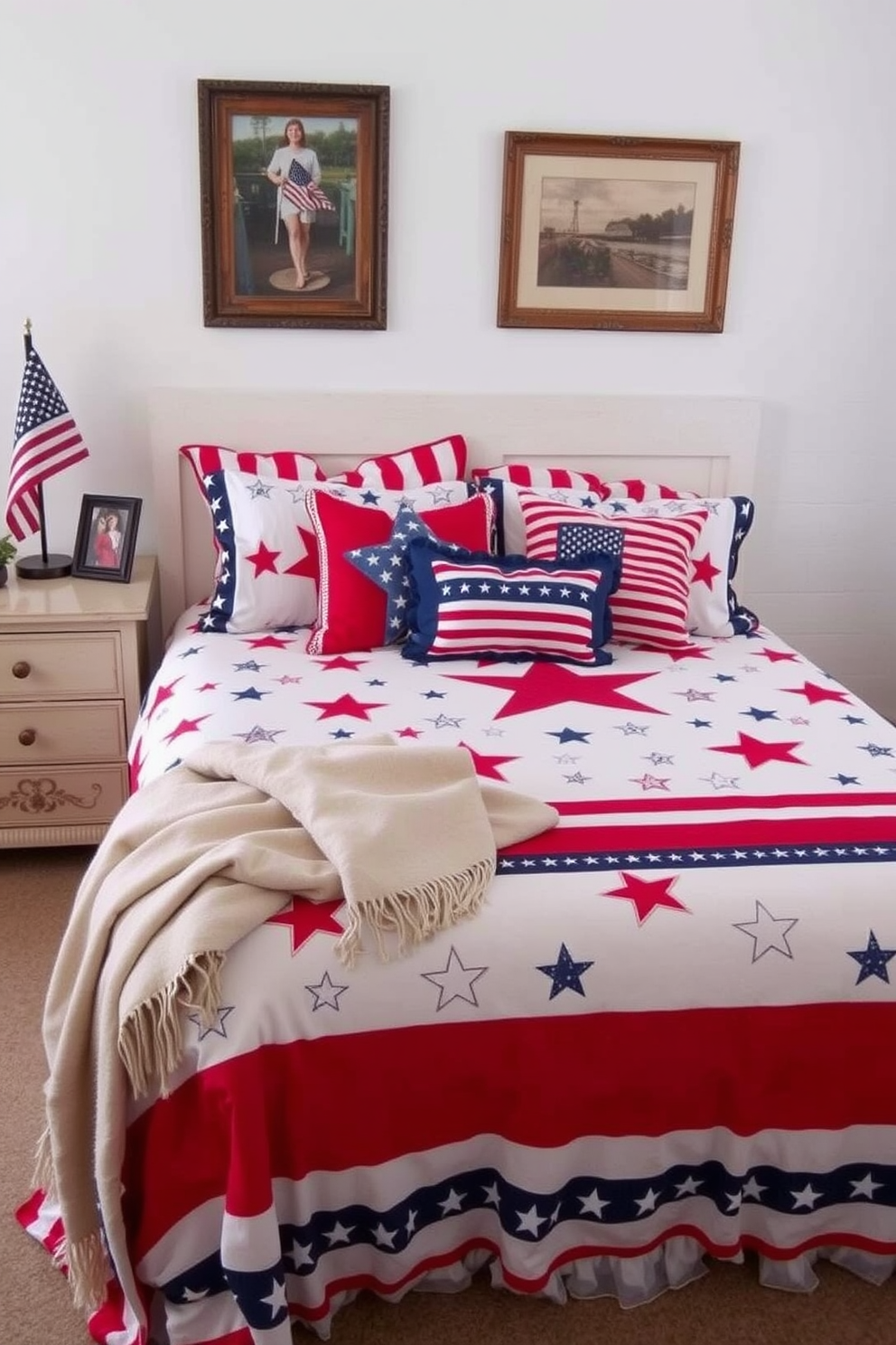 A cozy bedroom featuring a Memorial Day themed bedspread set adorned with stars and stripes in red, white, and blue. The bed is complemented by matching decorative pillows and a soft throw blanket draped at the foot. The walls are painted a soft white, creating a bright and airy atmosphere. A vintage wooden nightstand holds a small American flag and a framed photo, adding a personal touch to the decor.