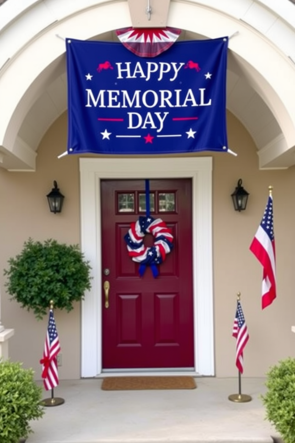 A vibrant seasonal banner hangs above the door, celebrating Memorial Day with patriotic colors and symbols. The entryway is adorned with red white and blue accents, including a decorative wreath and small flags on either side of the entrance.