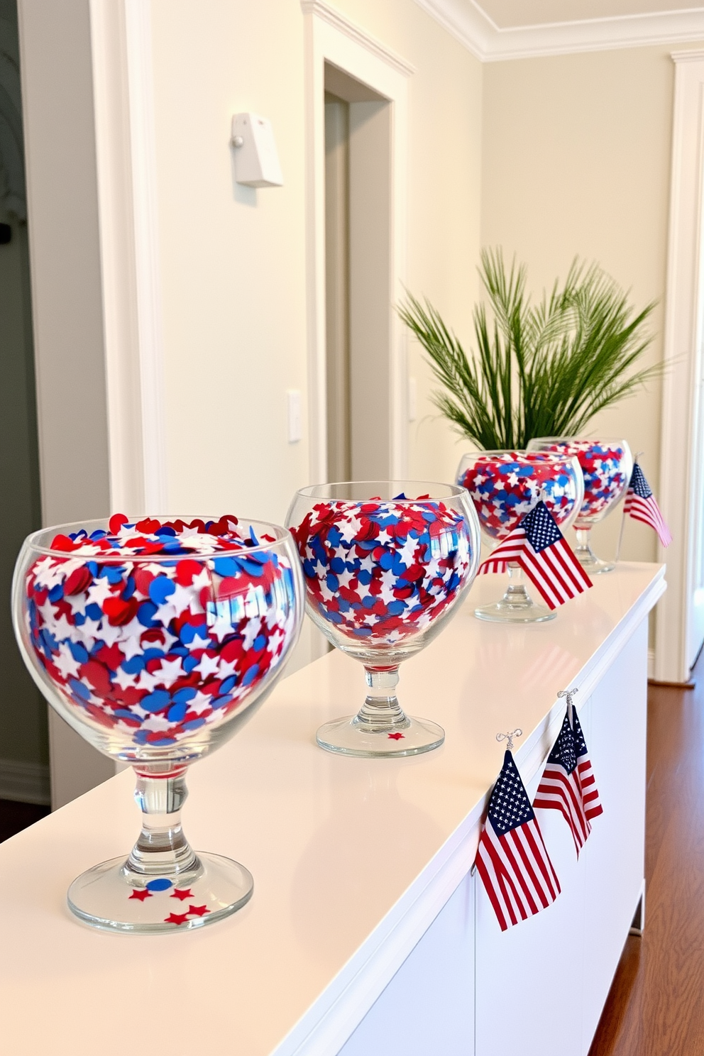 Decorative bowls filled with star confetti are arranged along a sleek console table in the hallway. The bowls are crafted from glass and showcase a vibrant mix of red white and blue confetti symbolizing Memorial Day. Soft lighting illuminates the hallway creating a warm inviting atmosphere. Alongside the bowls small American flags are placed to enhance the festive decor.