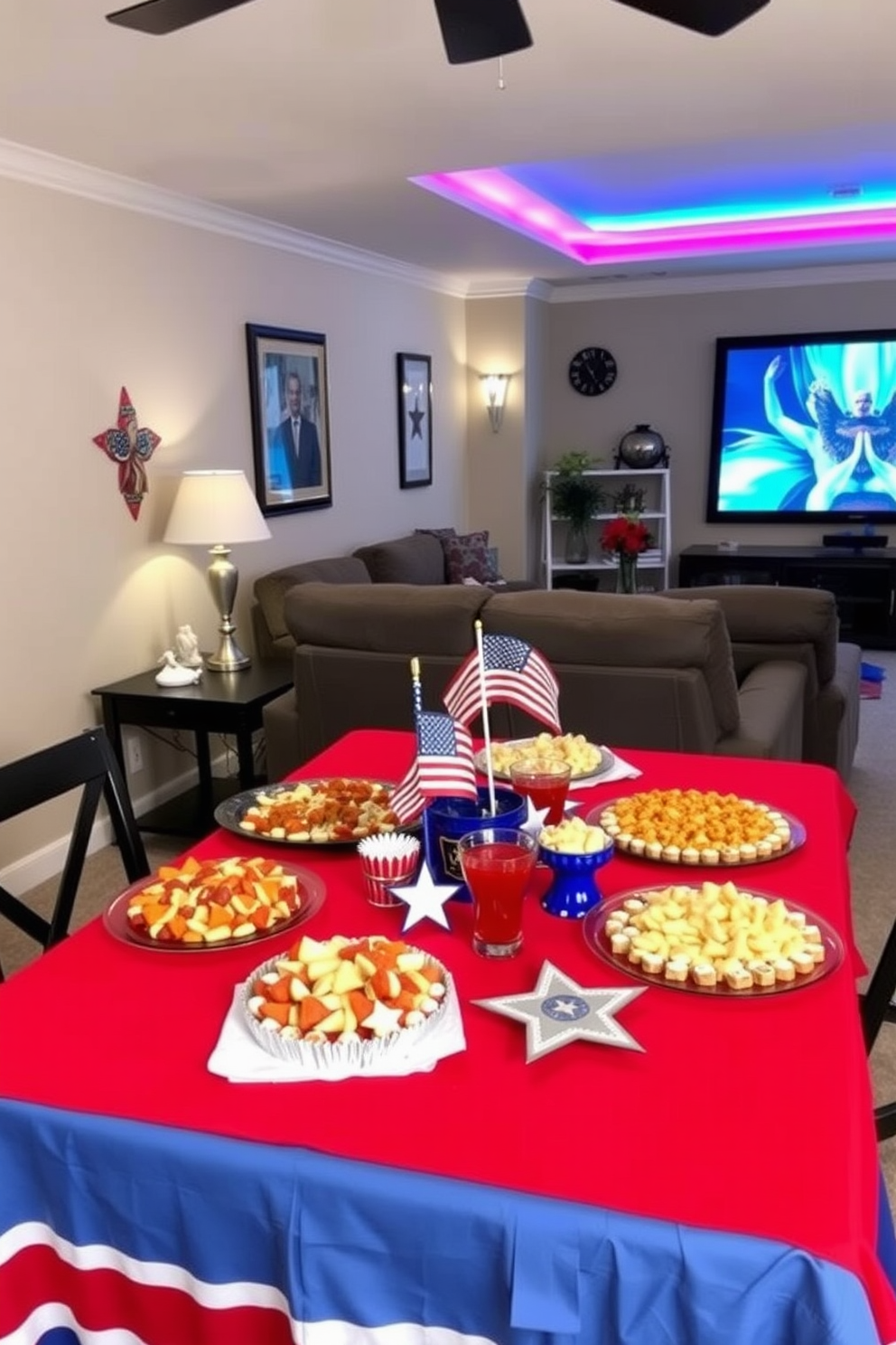 A festive table setting is adorned with a vibrant red and blue tablecloth. An array of colorful snacks is artfully arranged on platters, complemented by decorative stars and stripes accents. The home theater features plush seating arranged for optimal viewing. Soft ambient lighting enhances the cozy atmosphere, while thematic decorations celebrate Memorial Day.